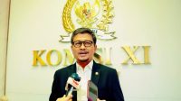 Anggota Komisi XI DPR RI, Amin Ak, saat ditemui Parlementaria di Gedung Nusantara II, Senayan, Jakarta. Foto: Mario/Karisma