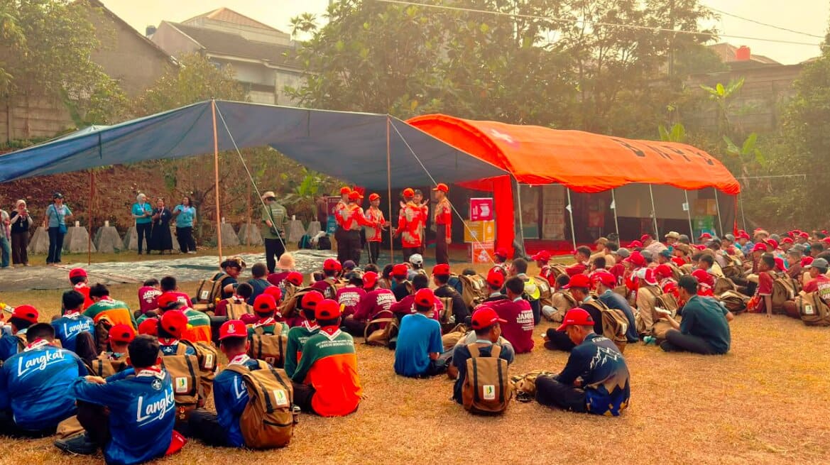 Peserta Jambore Nasional XII 2026 berkumpul di area Global Development Village untuk mengikuti program PBB yang memperkenalkan lima pilar pembangunan berkelanjutan: Manusia, Bumi, Perdamaian, Kesejahteraan, dan Kemitraan. Foto: Bayu Dwi Wicaksono/UNIC
